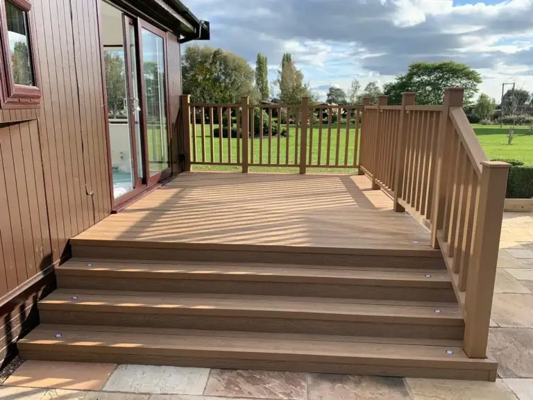 Composite decking installation with steps and balustrades installed garden landscapers in Lincoln, connecting a modern garden to the patio