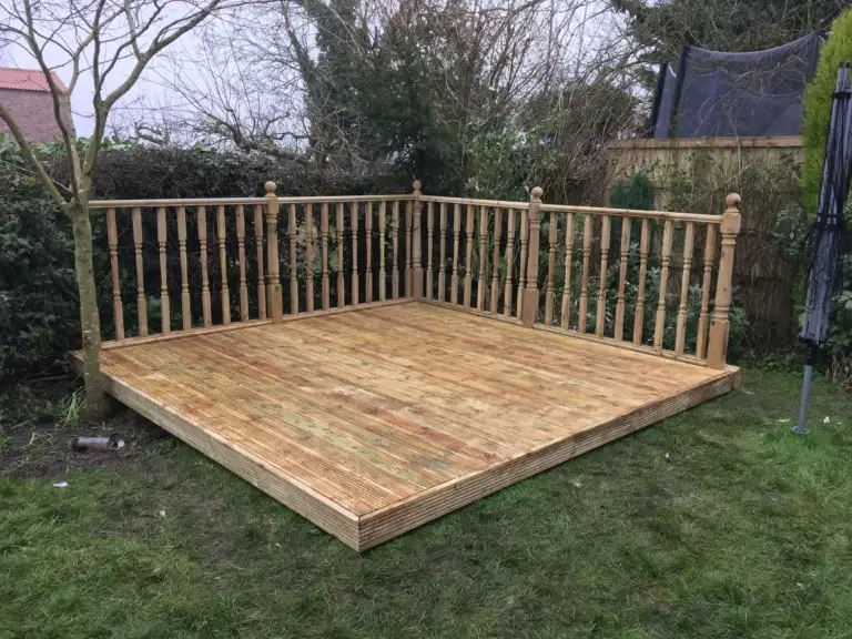 Custom decking installation designed for outdoor areas by landscapers in Lincoln.