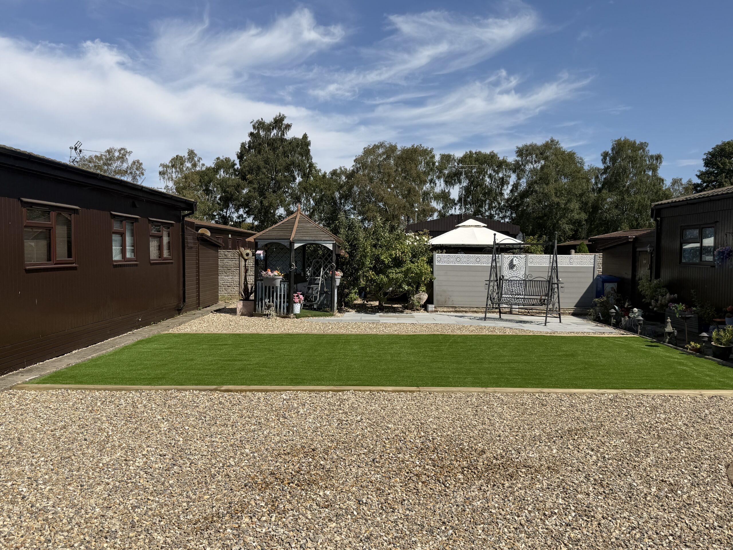Ground prepared and levelled before new grass is laid in a Lincolnshire garden