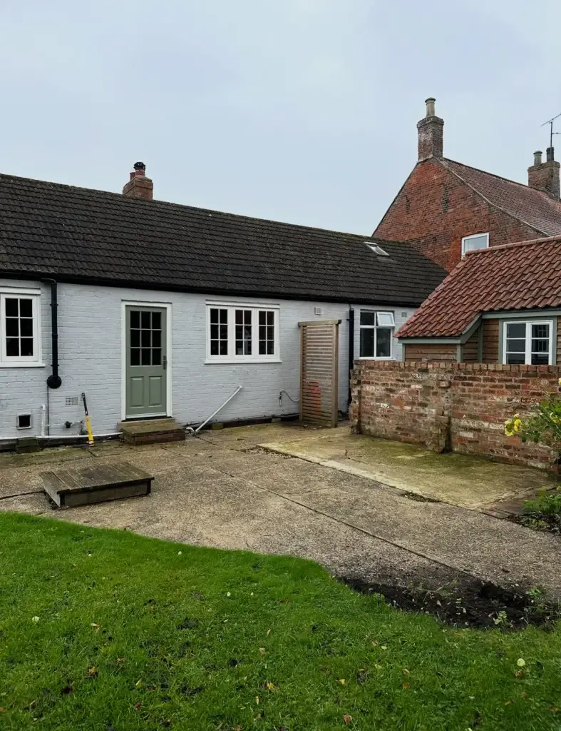 Landscape gardeners in Lincoln assessing garden before landscaping work begins