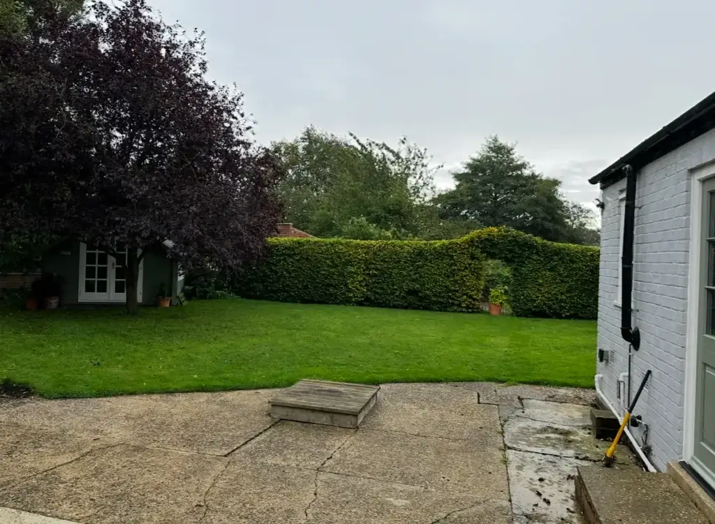 Landscape gardeners in Lincoln assessing garden before landscaping work begins
