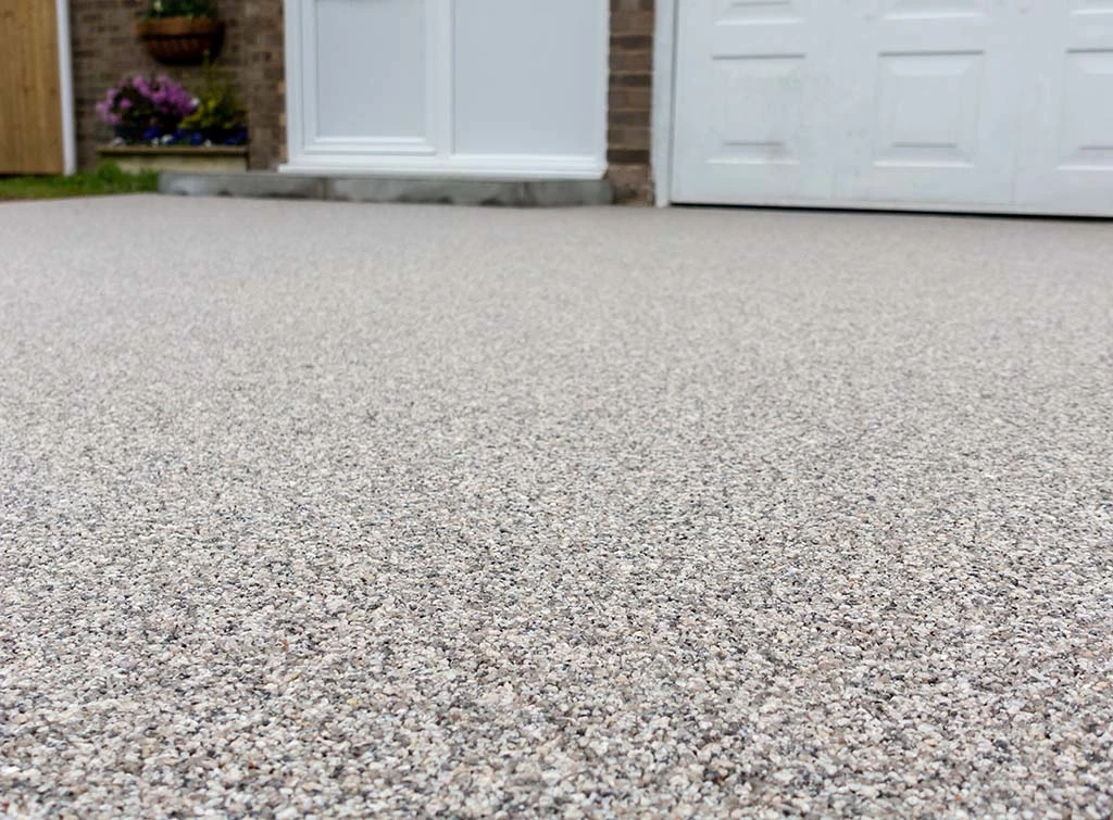 Picture of a grey resin driveway installation in Lincoln